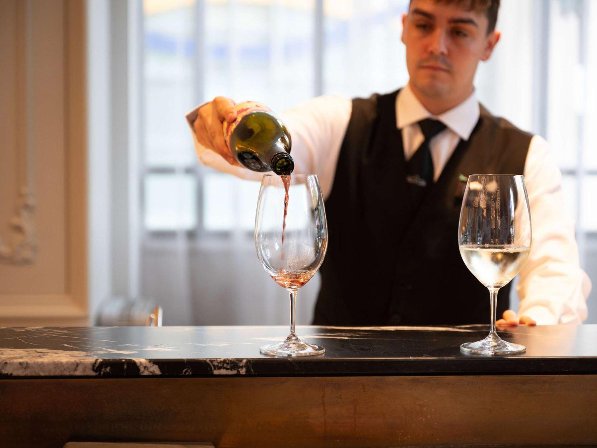 The Playford Adelaide - Mgallery Exterior photo A sommelier pouring wine